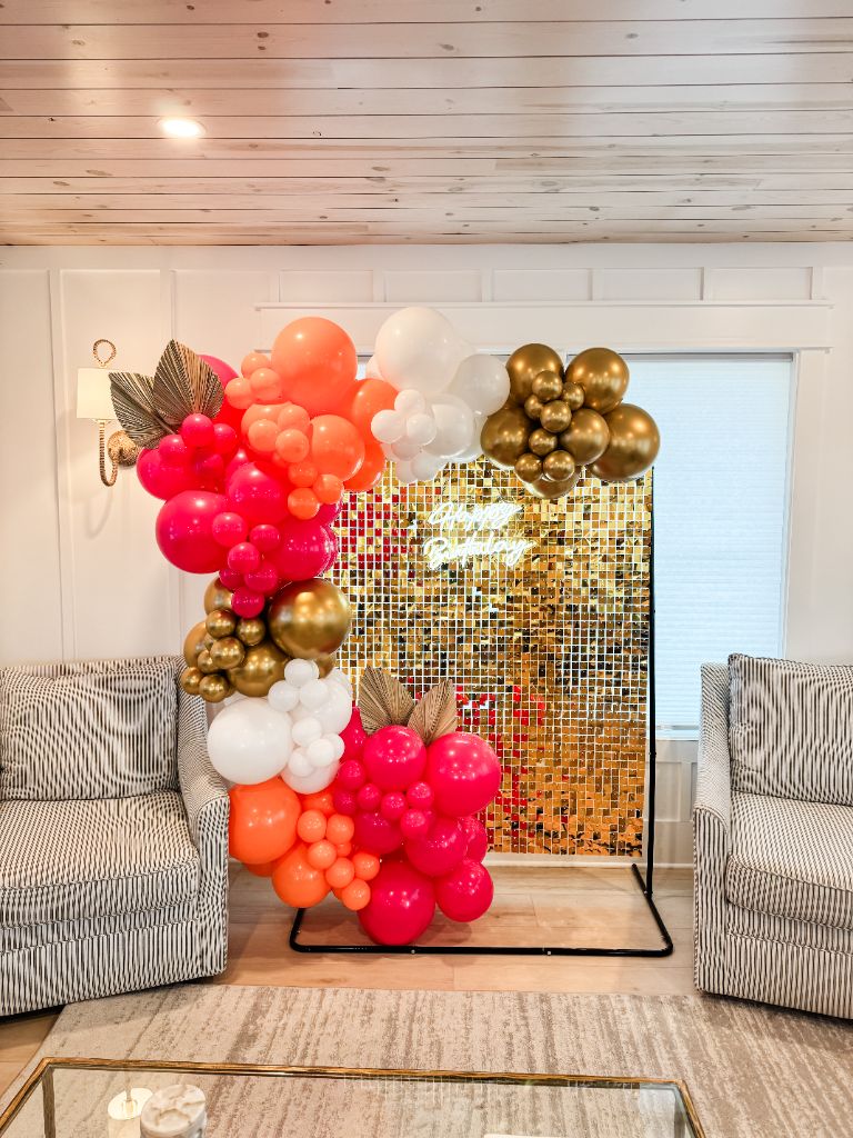Birthday shimmer backdrop with gold sequin wall